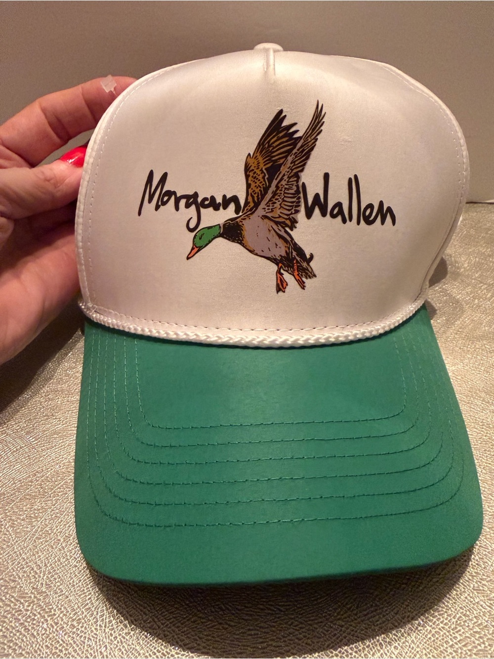 Morgan Whalen Trucker Hay. Adjustable. White and Green Duck Logo.